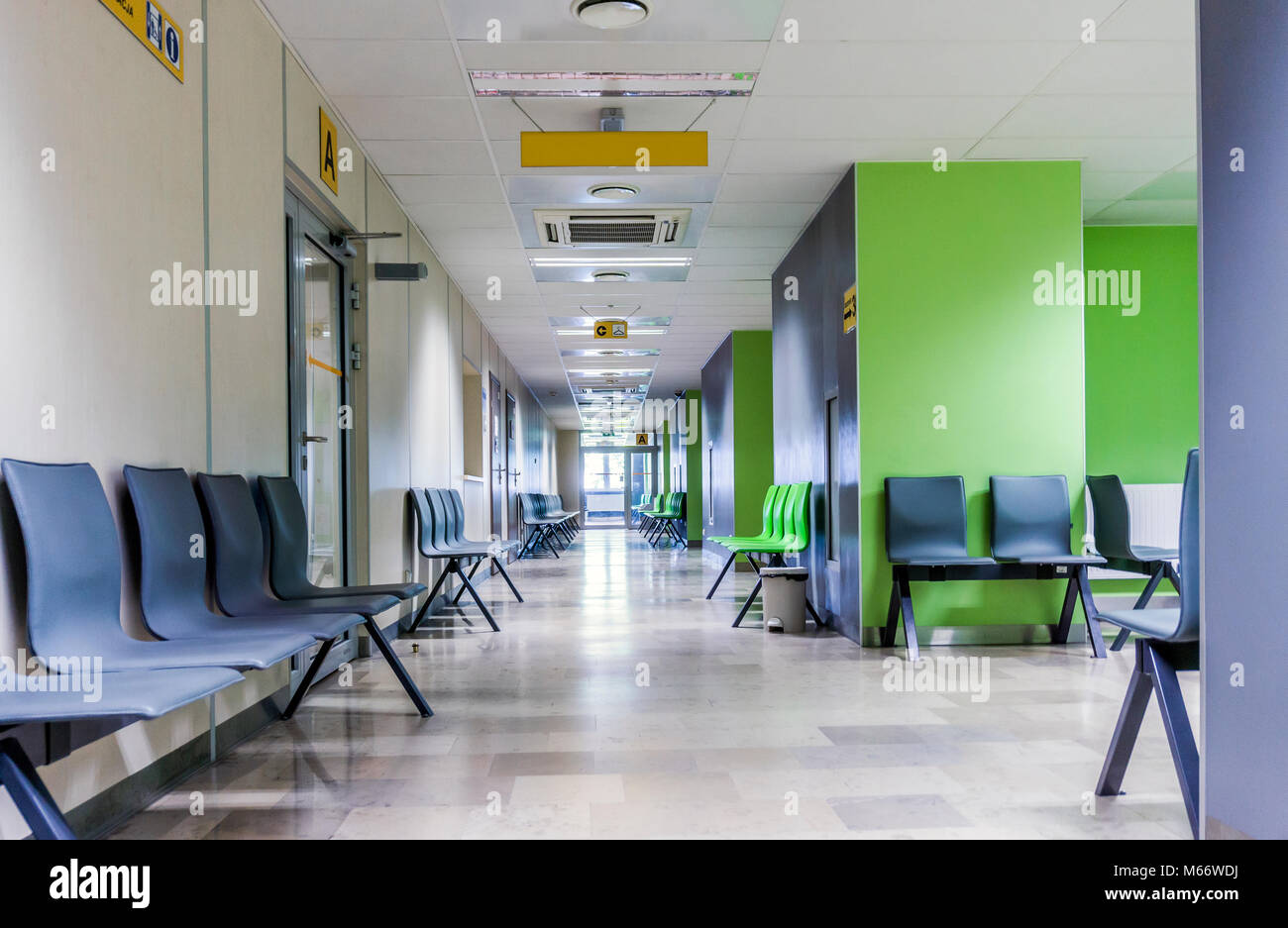 Corridor With Chairs For Patients In A Modern Hospital Stock