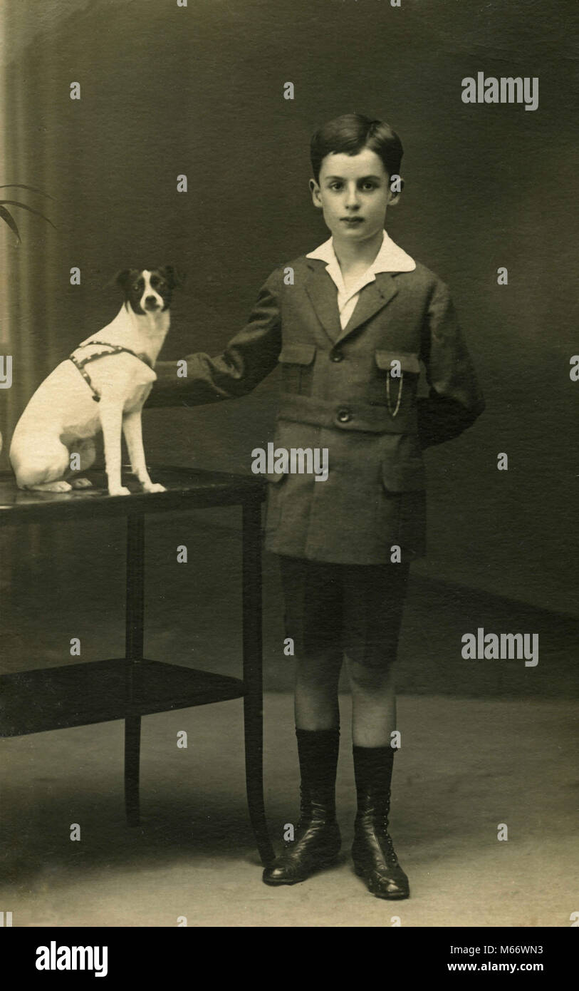 Portrait Of A Boy With A Small Dog Italy 1900s Stock Photo Alamy Portrait Of A Boy With A Small Dog Italy 1900s M66WN3
