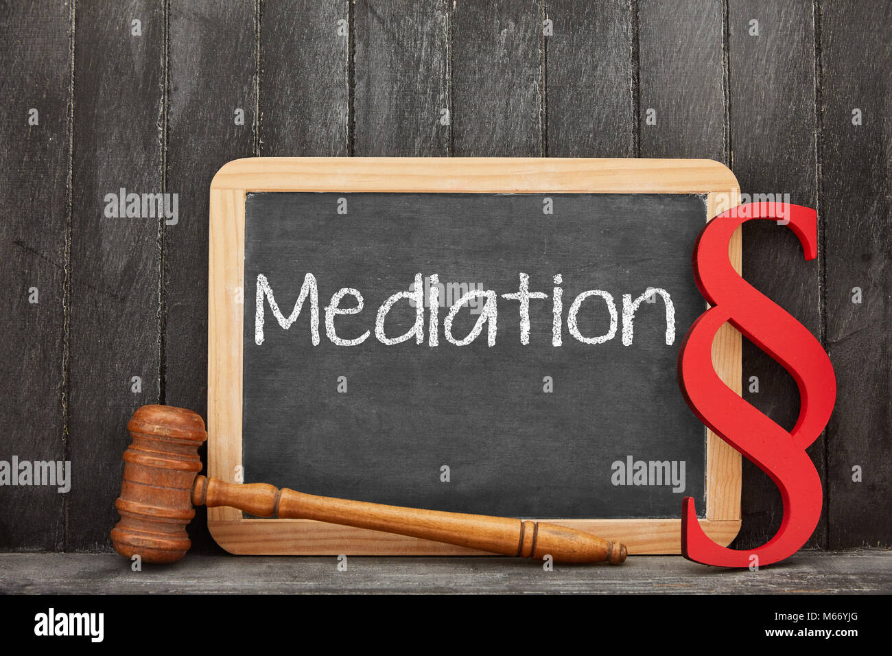 Mediation for dispute resolution as a concept on a blackboard Stock Photo