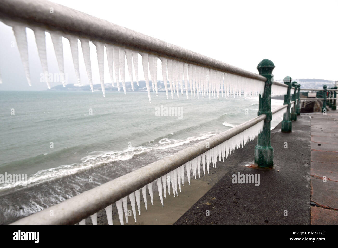 Icicles form on seafront railings at Penzance in Cornwall, as another ...