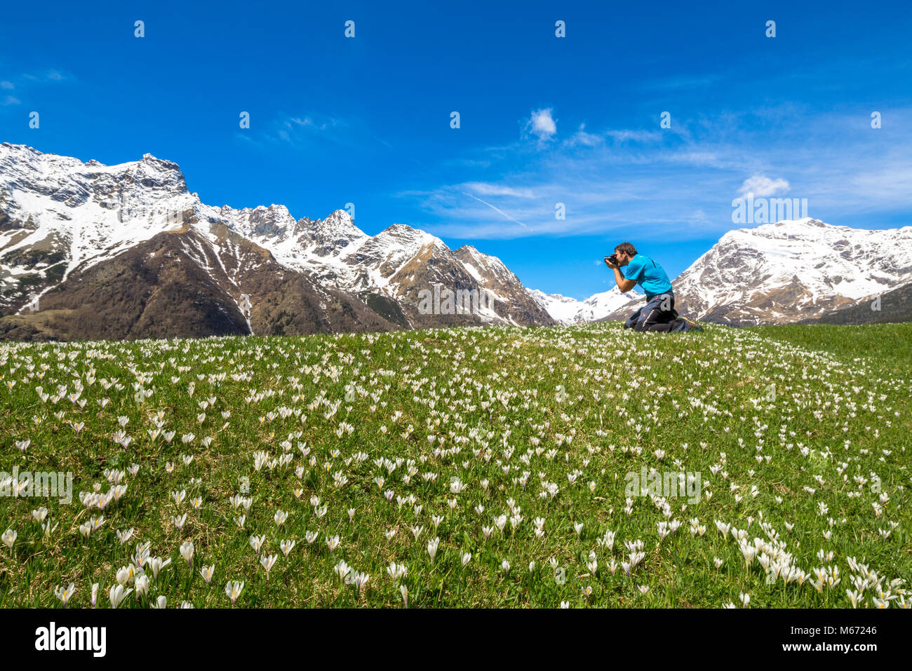 Photographer at Alpe Braccia, Malenco Valley, province of Sondrio, Valtellina, Lombardy, Italy Stock Photo
