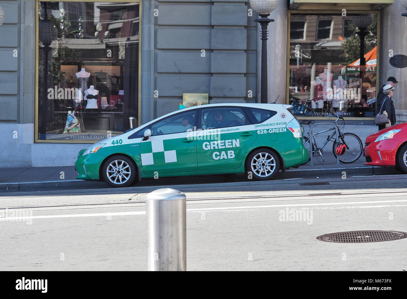 Green cab taxi car on a street in San Francisco, California, February 2018 Stock Photo