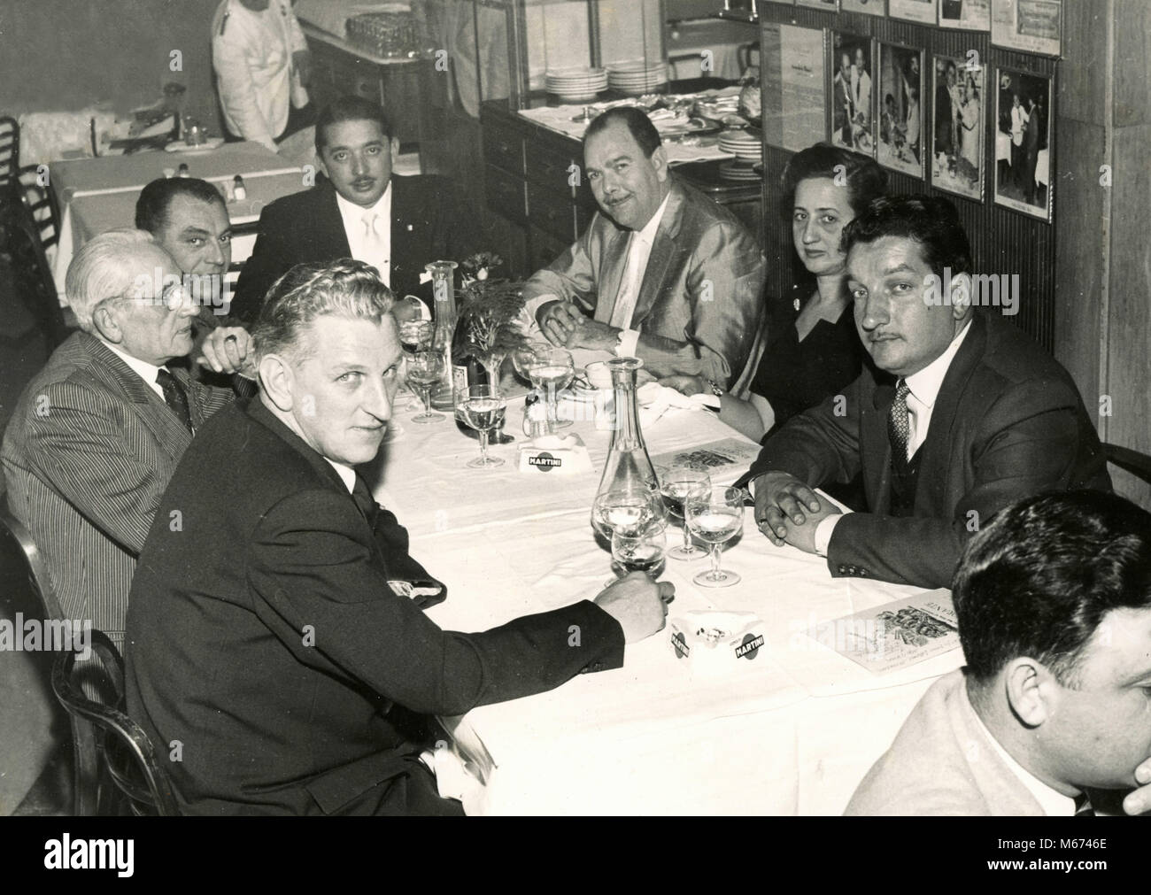 Group of men at the able of a restaurant, Italy 1950s Stock Photo
