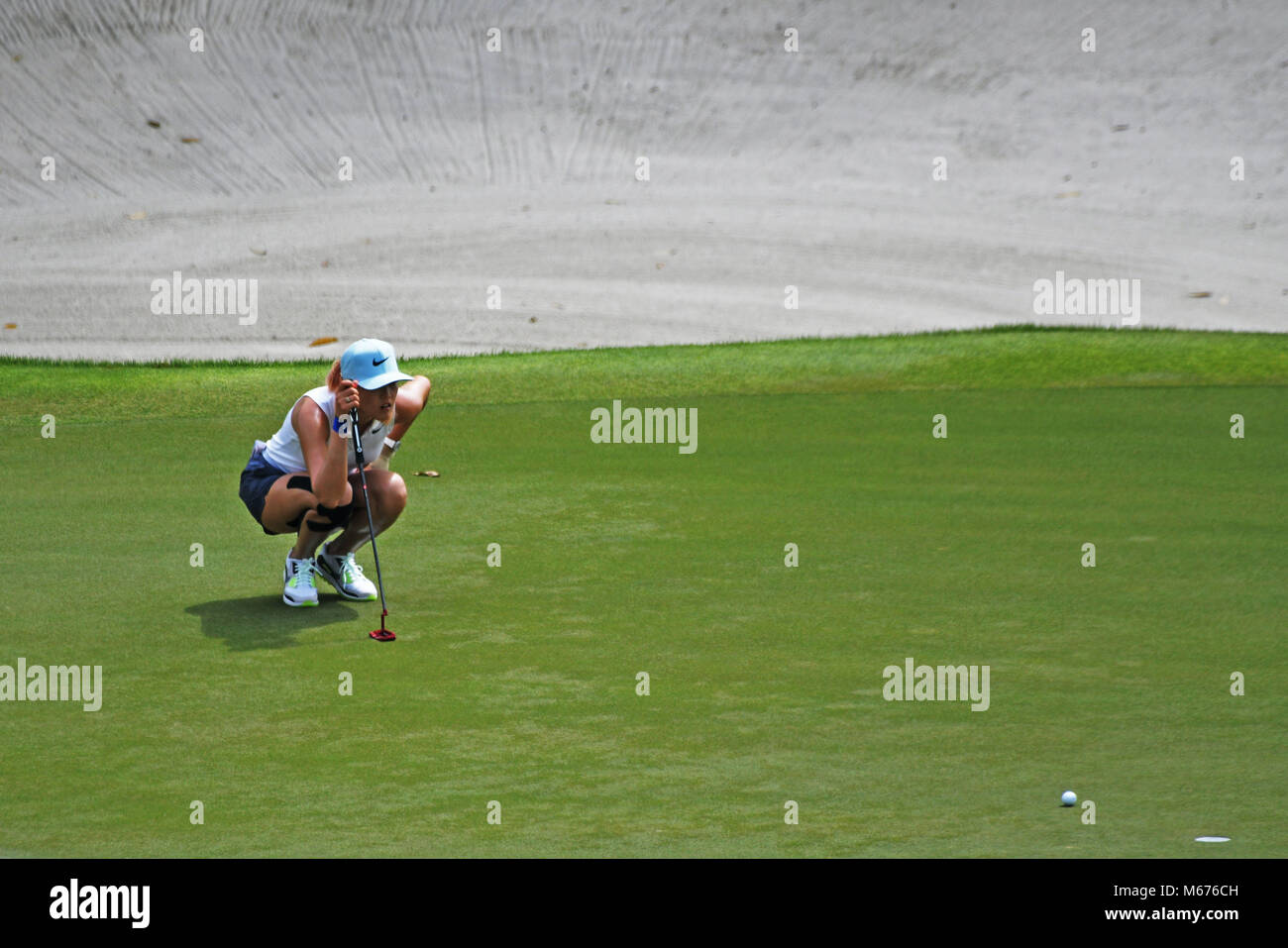 Singapore. 1st Mar, 2018. Michelle Wie of the United States competes during the first round of the HSBC Women's World Championship golf tournament in Singapore March 1, 2018. Credit: Then Chih Wey/Xinhua/Alamy Live News Stock Photo