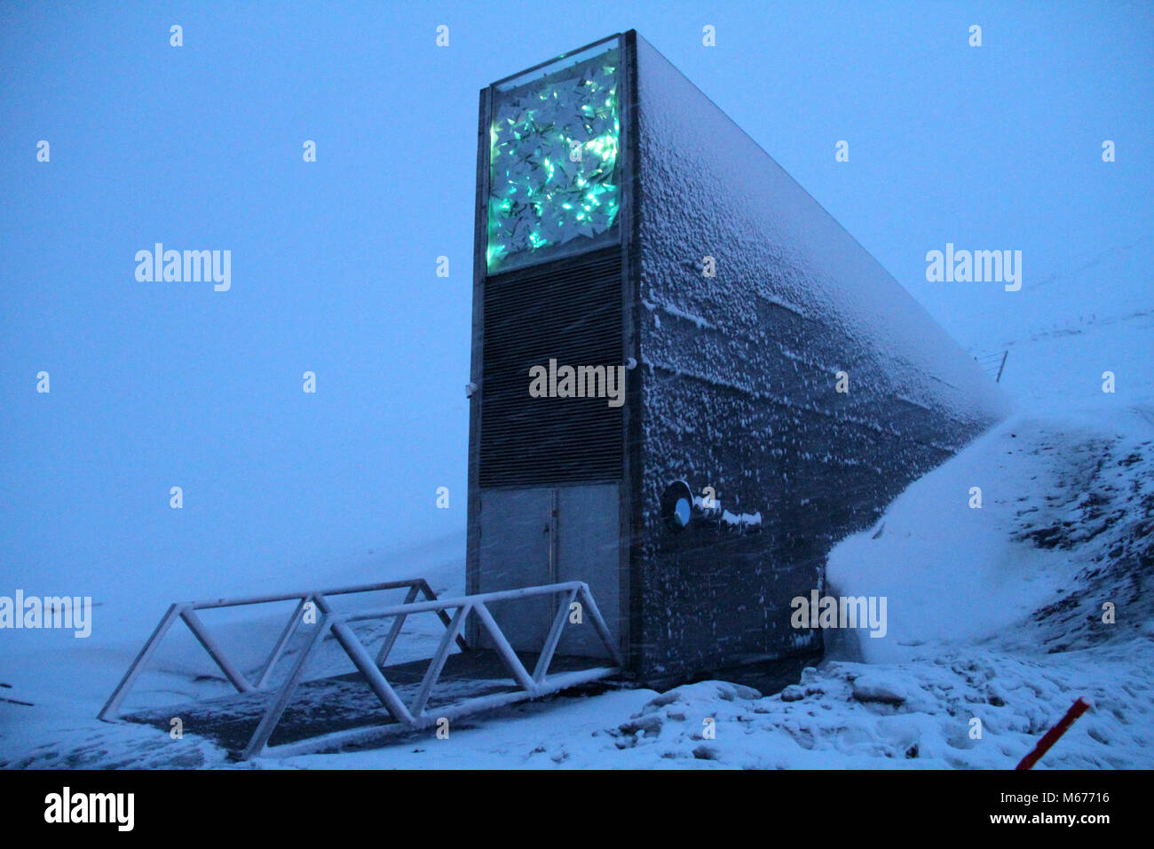 (180301) -- SVALBARD, March 1, 2018 (Xinhua) -- Photo taken on Feb. 27, 2018 shows the entrance of Svalbard Global Seed Vault on Norway's remote Arctic archipelago of Svalbard. The underground agricultural seed bank in Norway will receive a 13-million-U.S.-dollar grant for upgrade as it celebrates its 10th anniversary this year, the Norwegian government has said. The Svalbard Global Seed Vault, dubbed the 'Doomsday' and the 'Noah's Ark' vault, was established as a backup of crop seed samples stored in other seed banks around the world. It is considered to be a vital international facility to s Stock Photo