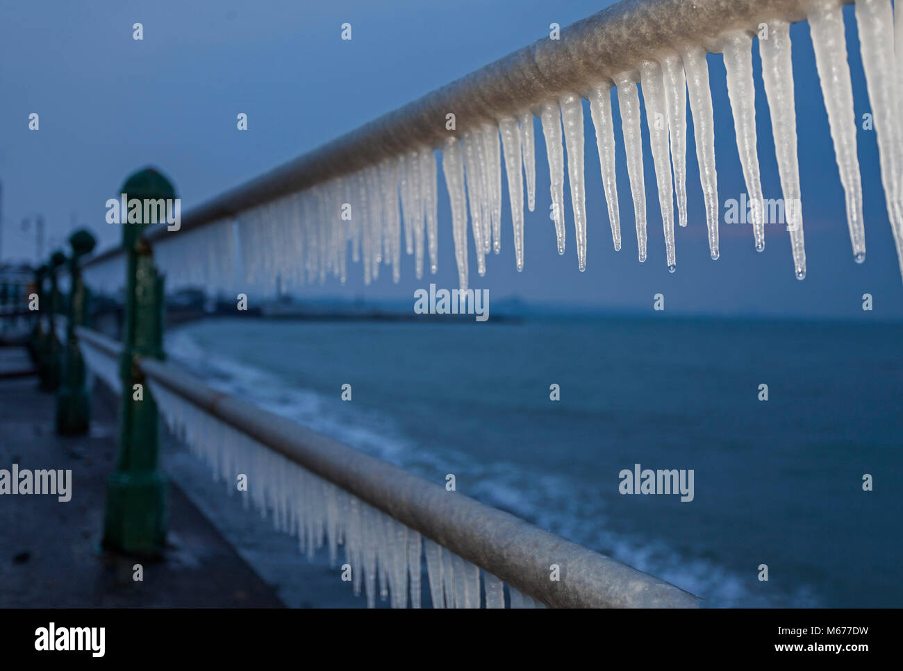 Penzance, Cornwall. 1st Mar, 2018. UK Weather. Penzance, Cornwall UK. Sea water has frozen in to dramatic icicles on the seaside town's promenade railings during the Beast from the East,  Credit Mike Newman/AlamyLiveNews Stock Photo