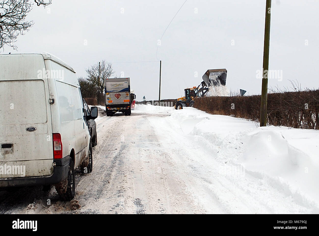 Norfolk Uk 1st Mar 18 Uk Weather Tractor Becomes A Snow Plough Stock Photo Alamy