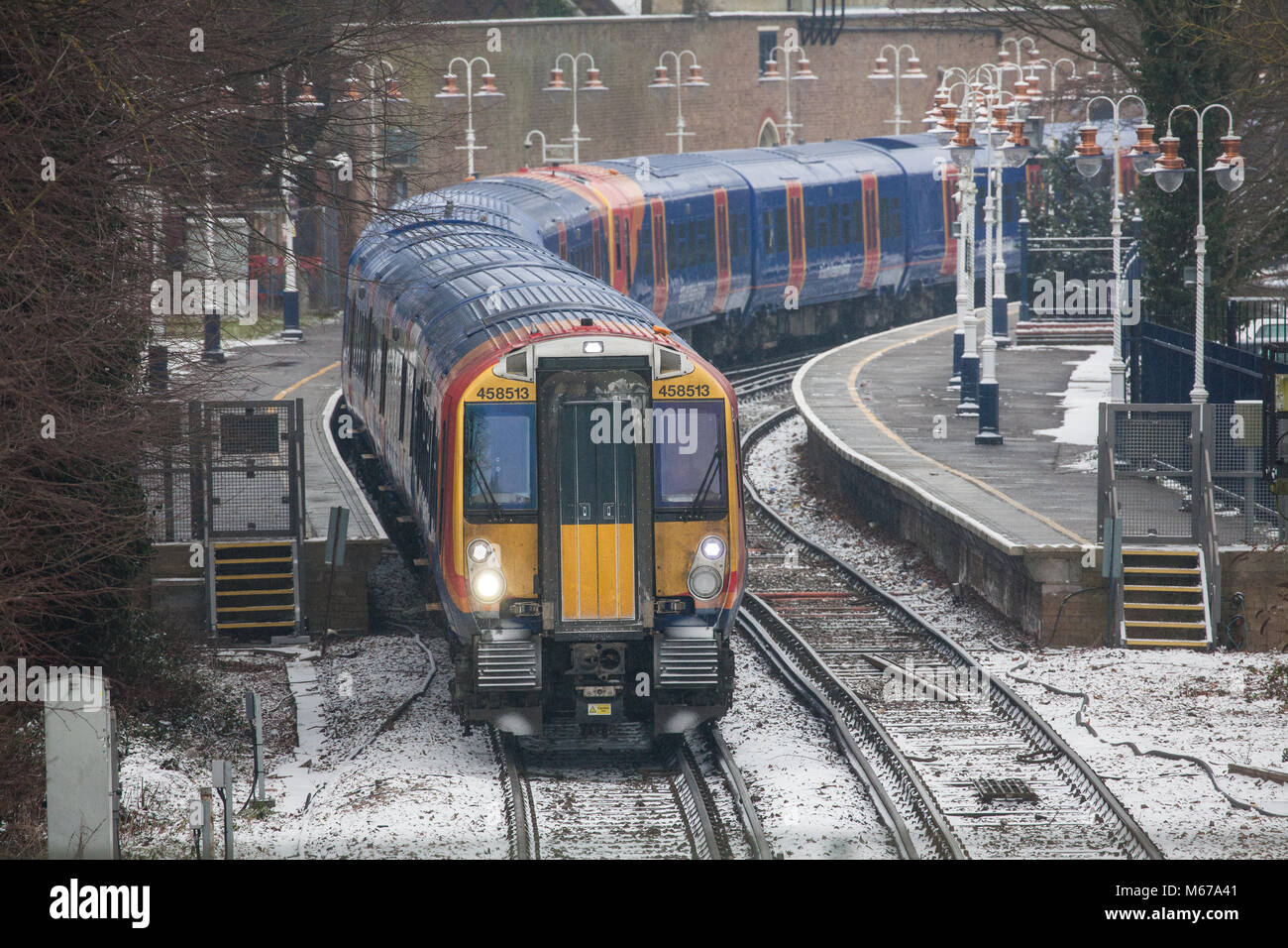 Windsor, UK. 1st March, 2018. UK Weather: A South West Trains service leaves Windsor and Eton Riverside station en route to London Waterloo. South West Trains are running a good service from Windsor into London but services via Great Western Trains into London Paddington have been subject to closures (Paddington station has been closed), cancellations and delays. Credit: Mark Kerrison/Alamy Live News Stock Photo