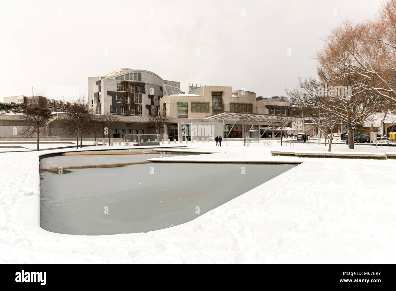 Edinburgh, Scotland, UK. 1st March, 2018. The Beast from the East, Storm Emma hit Edinburgh overnight and has left transport links decimated and many of the shops on the famous Princes Street closed for the day.  Pictured: The Scottish Parliament in the snow Credit: Rich Dyson/Alamy Live News Stock Photo