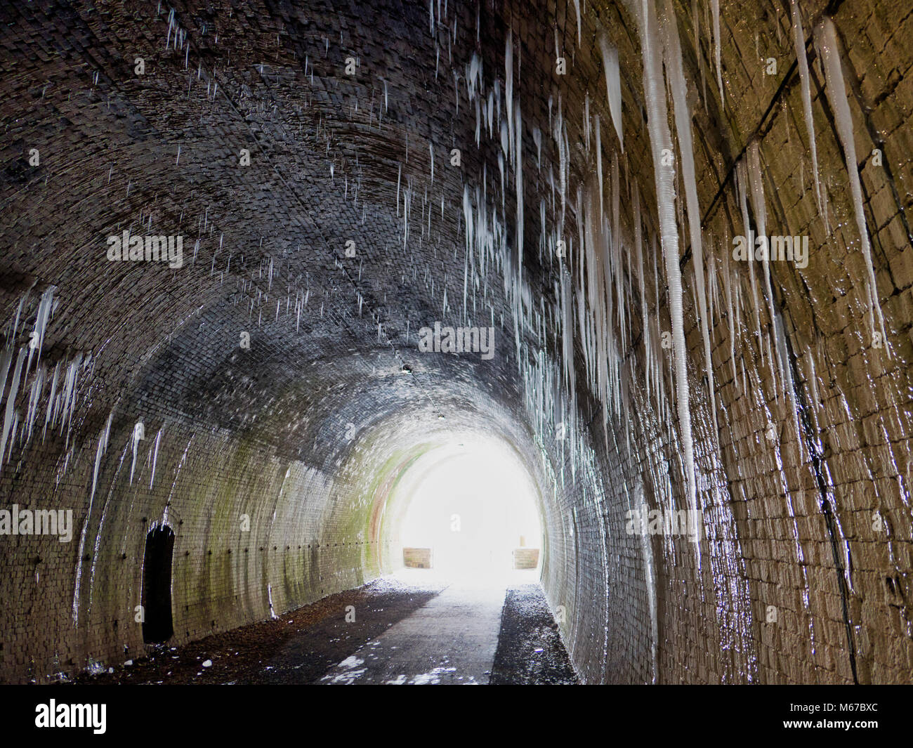 Peak District National Park, Derbyshire, UK. 1st March, 2018. UK Weather: Cold Beast From the East conditions produces six foot long icicles inside the frozen Ashbourne Tunnel on the Tissington Trail railway walk in the Peak District National Park, Derbyshire, England, UK Credit: Doug Blane/Alamy Live News Stock Photo