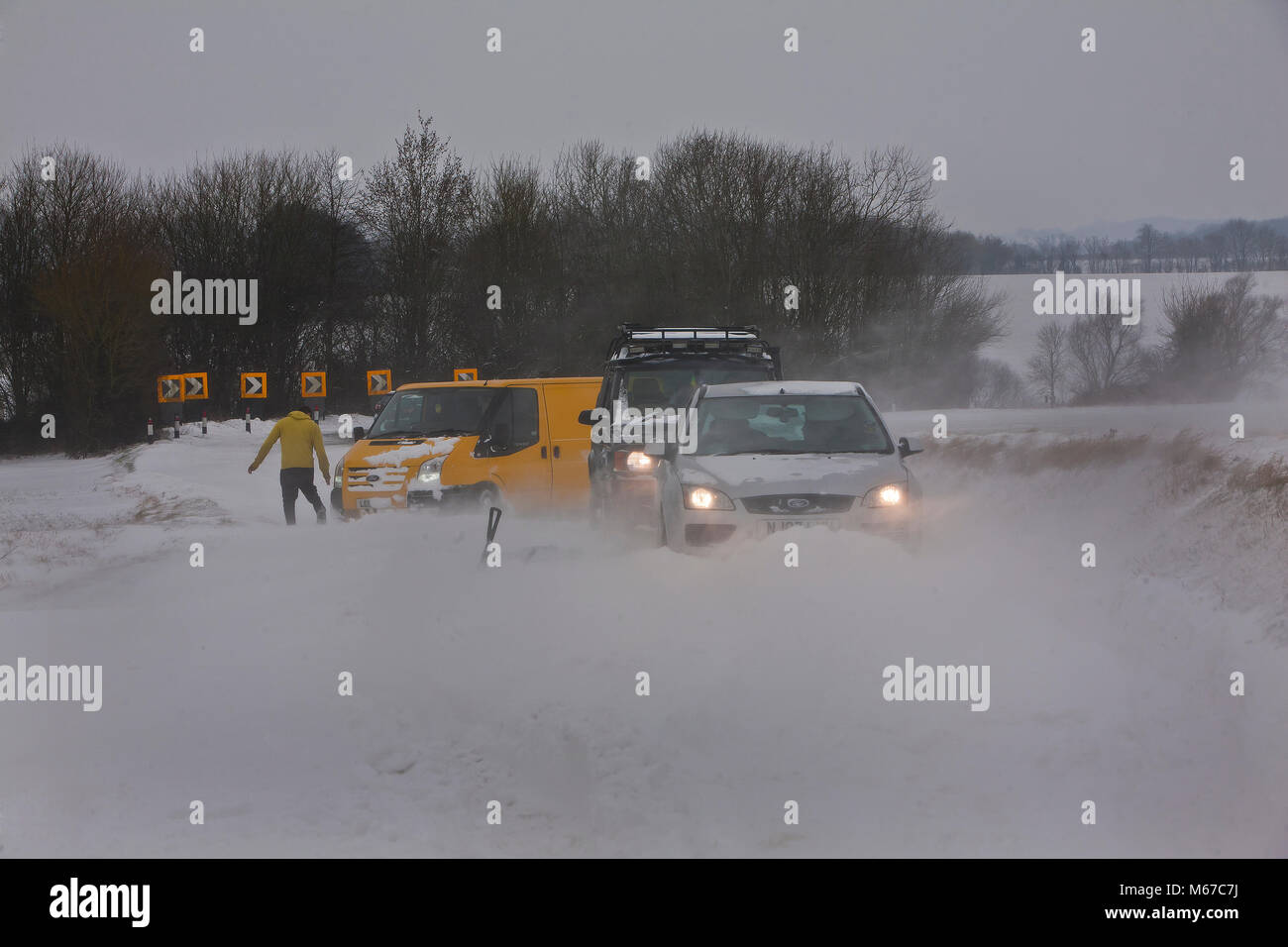 Steeple Bumpstead, Essex, UK. 1st March, 2018. Snowmageddon! As temperatures plummeted across Britain today and the Beast from the East took hold, these unlucky motorists were stuck in drifting snow in Steeple Bumpstead Essex 01/03/2018 Please credit  : George Impey Credit: George Impey/Alamy Live News Stock Photo