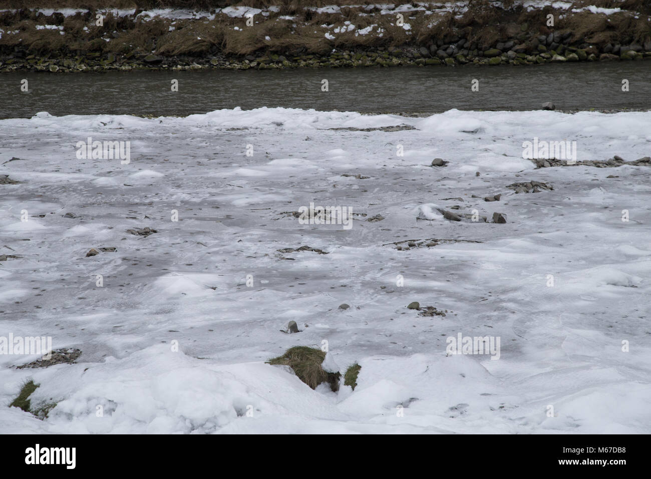 Aberystwyth, Ceredigion, mid Wales. 1st Mar, 2018. A very unusual sight, as the banks of the river Ystwyth freeze at Aberystwyth. Credit: atgof.co/Alamy Live News Stock Photo