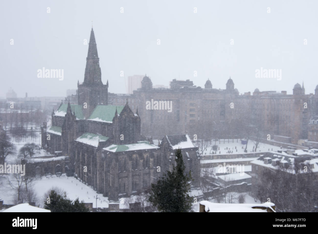 Glasgow, Scotland, UK. 1st March, 2018. Blizzard conditions looking towards Glasgow Cathedral and Royal Infirmary from the Necropolis graveyard in Glasgow, as Beast from the East weather system hits Scotland Credit: Tony Clerkson/Alamy Live News Stock Photo