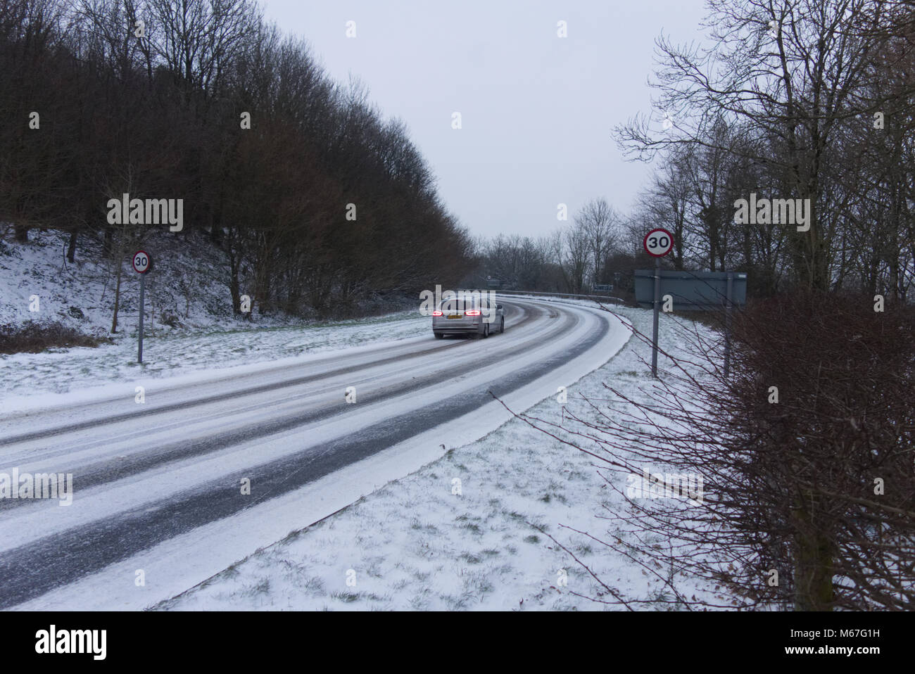 Plymouth, UK. 1st March, 2018. Due to the snow from Storm Emma a car is