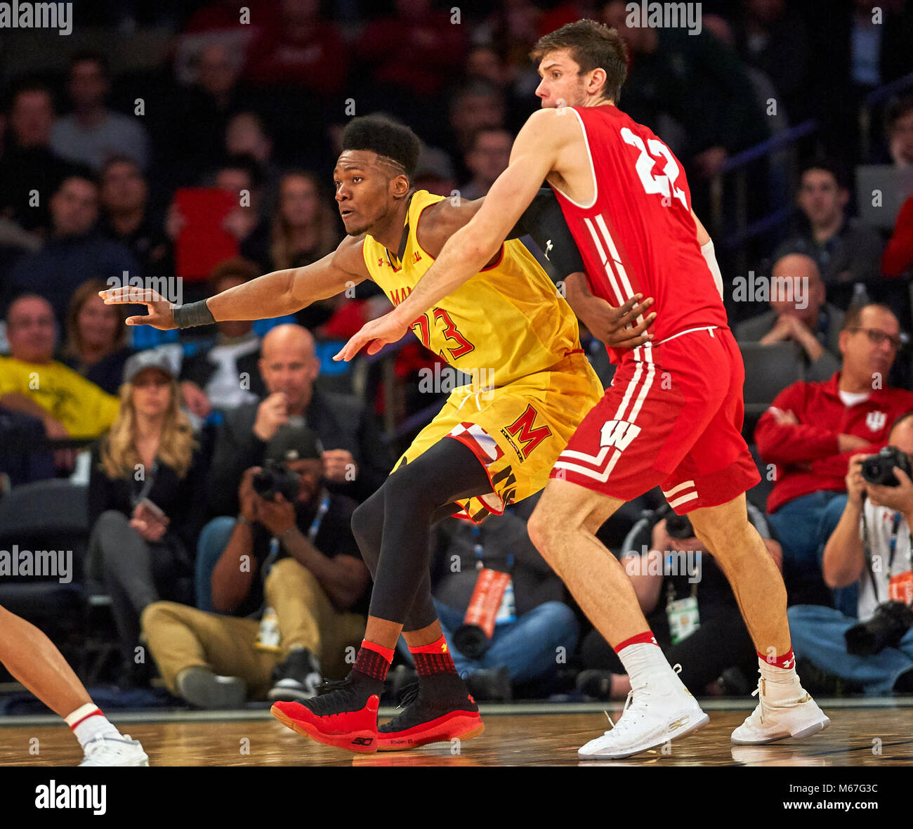 New York, New York, USA. 1st Mar, 2018. Maryland Terrapins forward Bruno Fernando (23) tries to get the low post against Wisconsin Badgers forward Ethan Happ (22) in the first half during the second round of Big Ten Conference Tournament play at Madison Square Garden in New York City. Duncan Williams/CSM/Alamy Live News Stock Photo