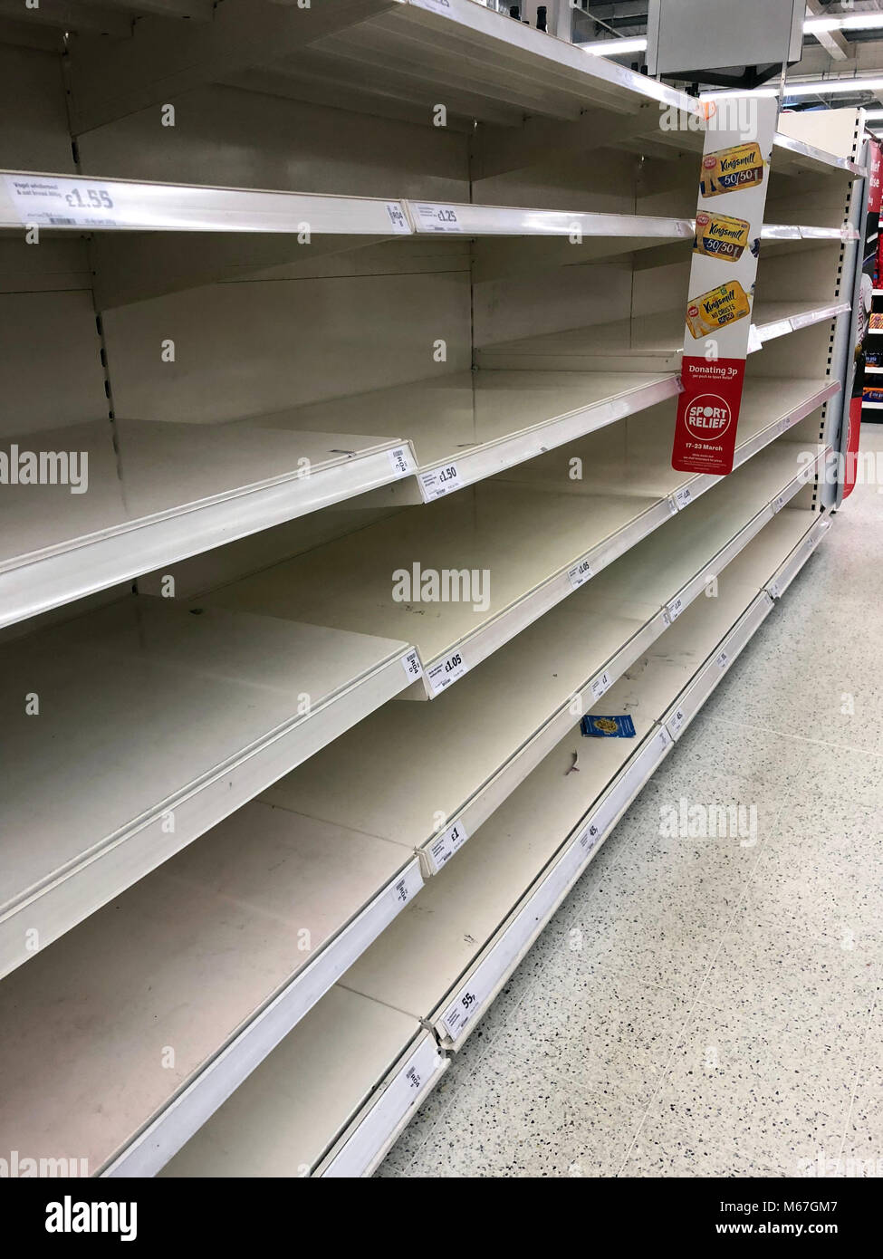 Empty bread shelves hi-res stock photography and images - Alamy, image size:975x1390