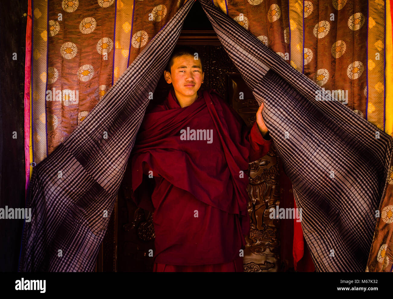 A Tibetan monk living in monastery Stock Photo Alamy