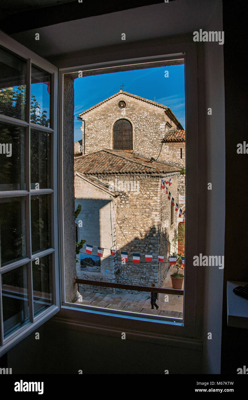 Stone Church And People View Through Window In The Village
