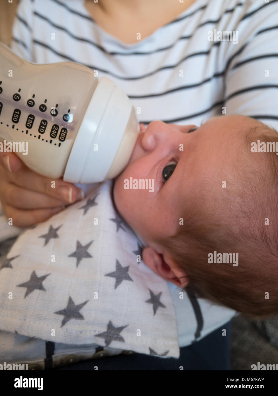newborn baby drinking bottle