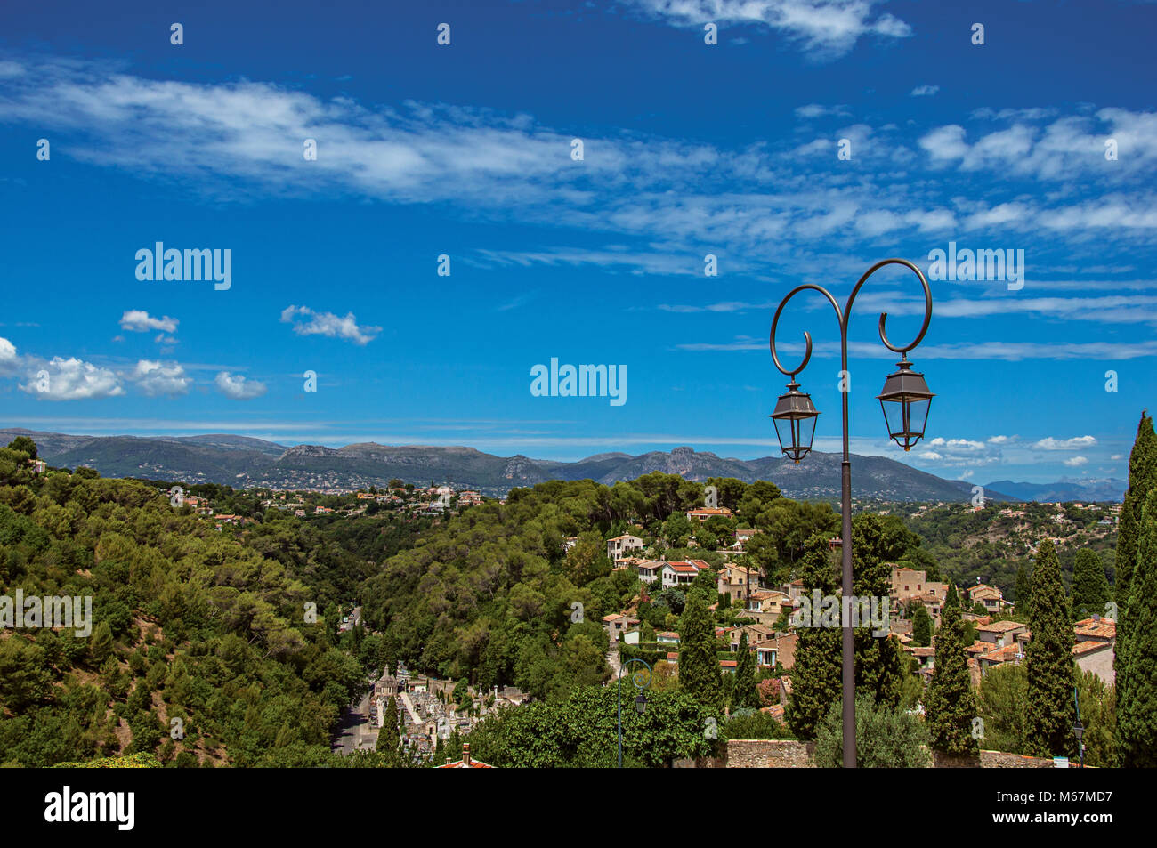 View of hills, rooftops and lamp in HautdeCagnes, a village on top of