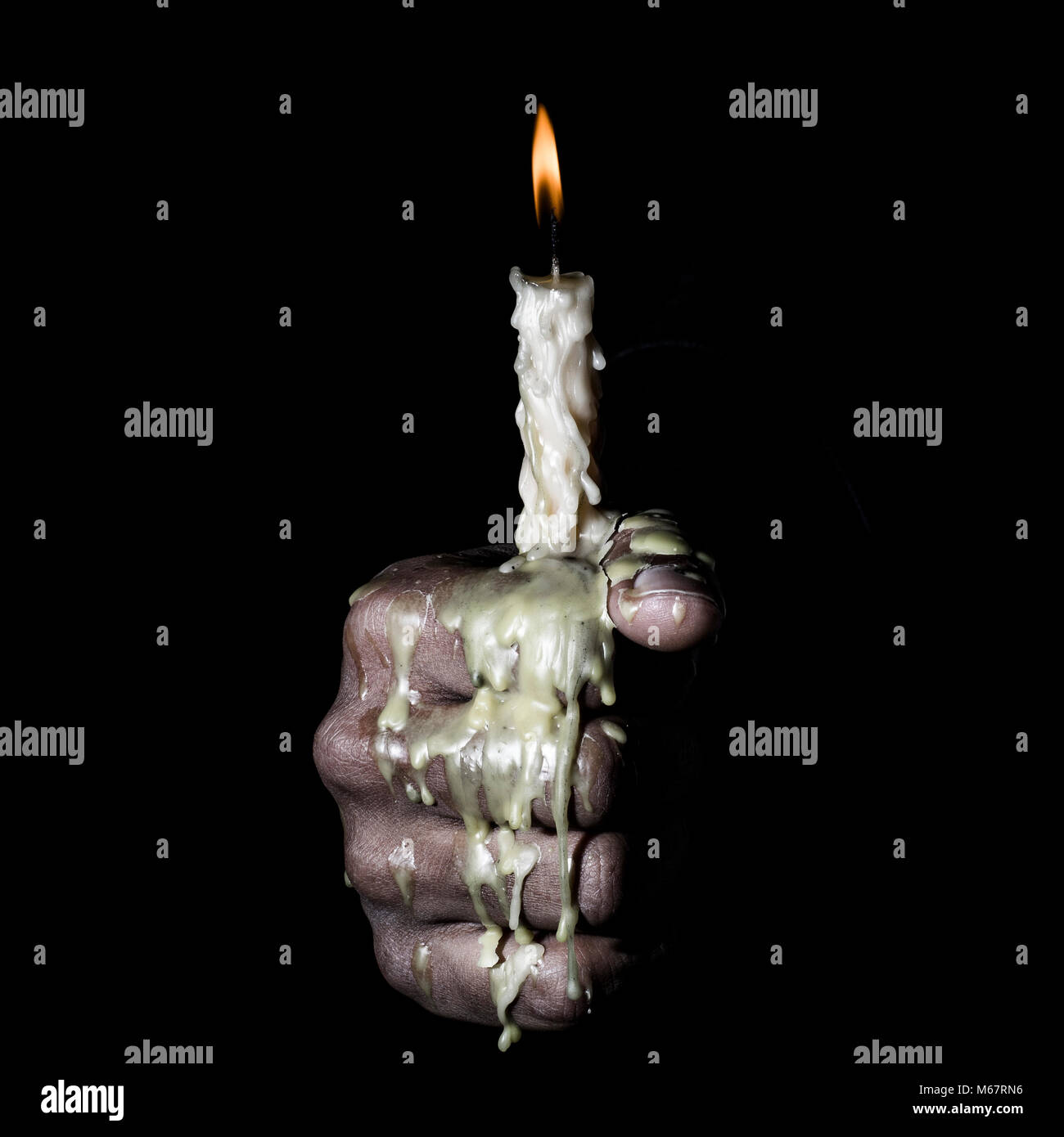 hand holding a candle Stock Photo Alamy