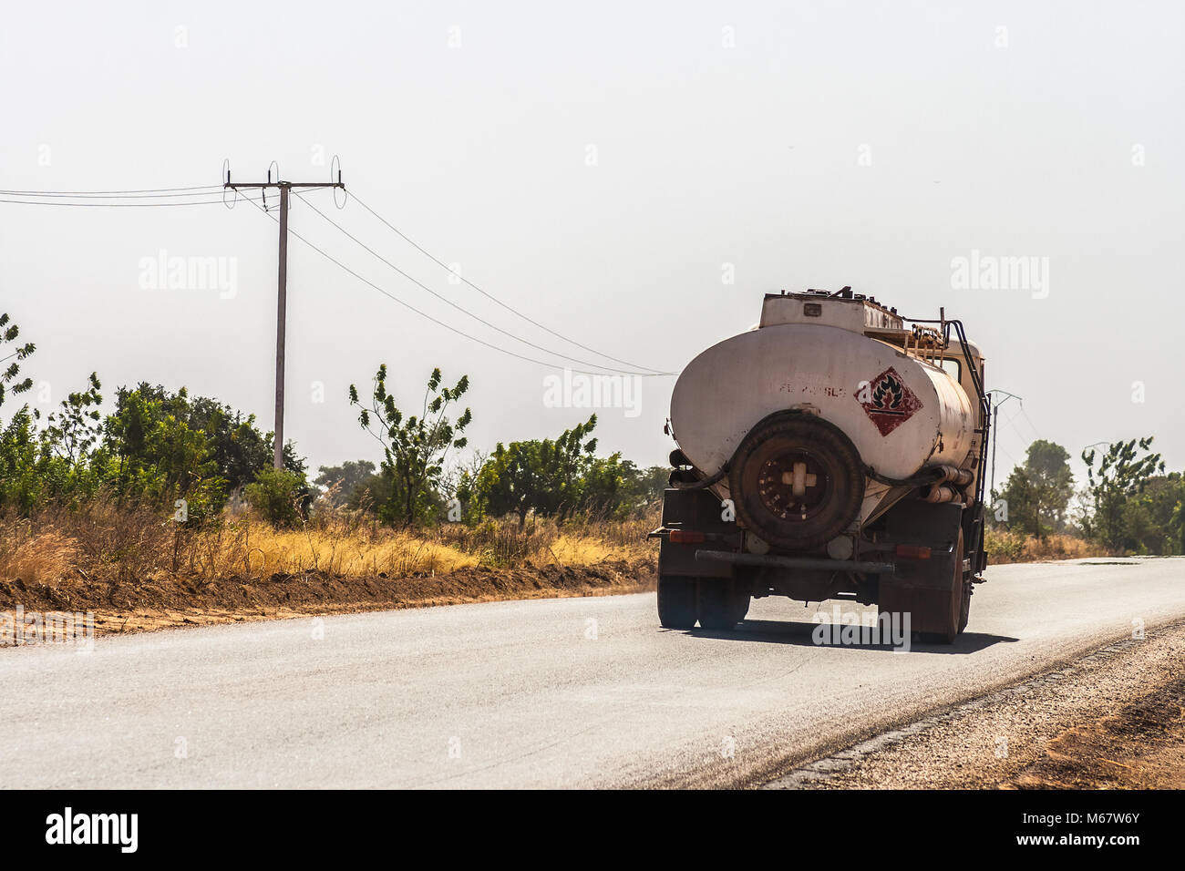 Fuel truck on the State Road 1 heading to Bobo-Dioulasso, Burkina Faso. Stock Photo