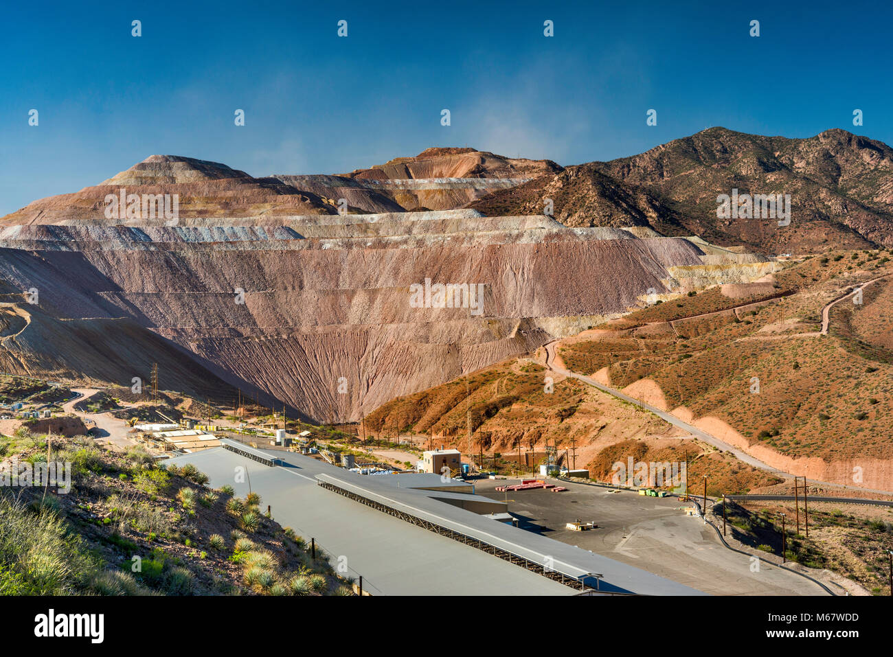 Haze after blast over openpit at Morenci Copper Mine, operated by FreeportMcMoRan Copper