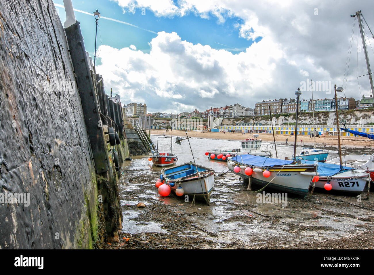 boats in harbour with tide out at viking bay, Broadstairs Stock Photo