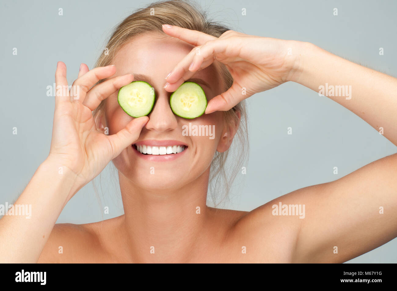 Download Beauty The Natural Way Facial Mask With Cucumber Beautiful Woman Stock Photo 175966492 Alamy PSD Mockup Templates