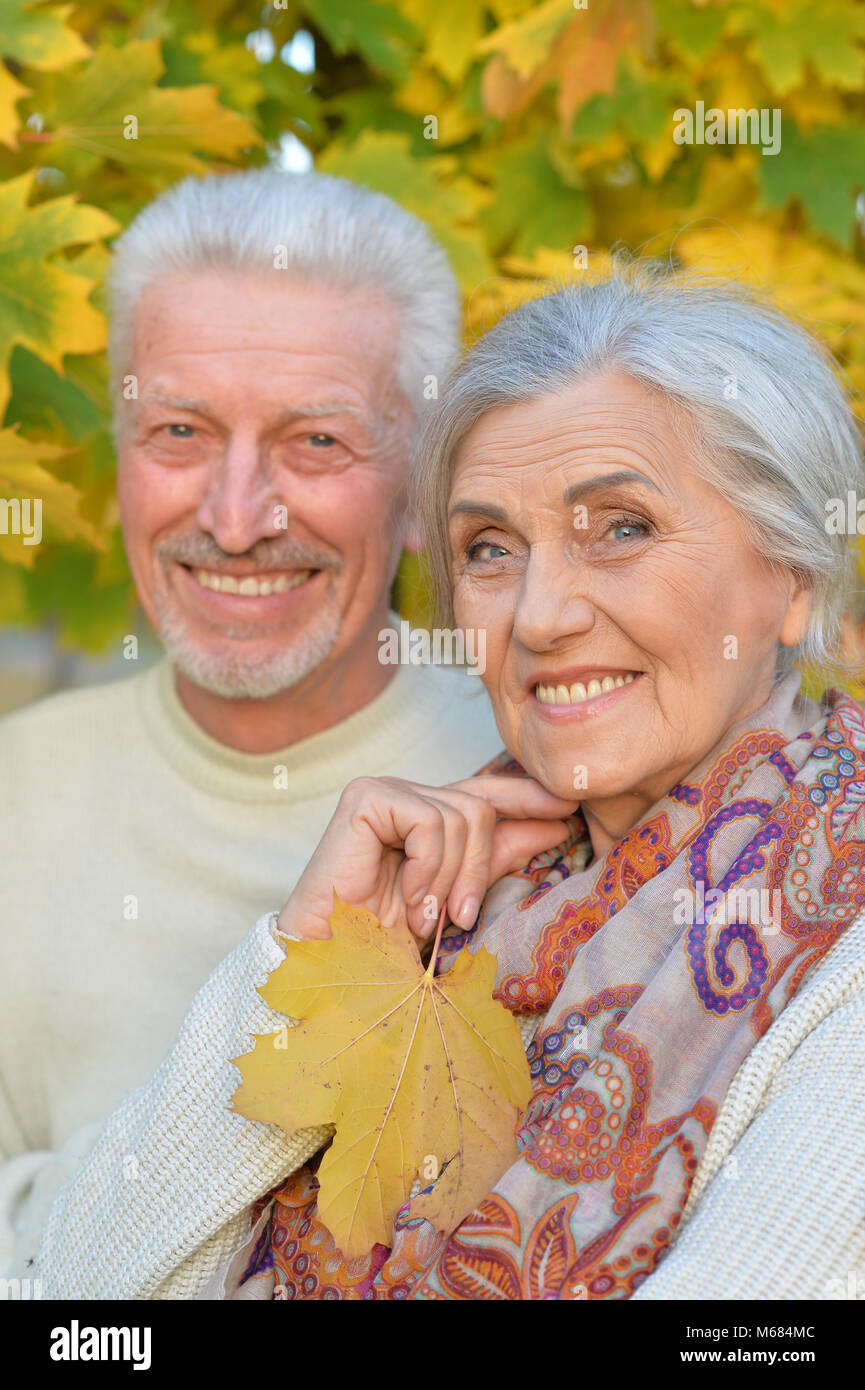 beautiful caucasian senior couple in the park Stock Photo - Alamy