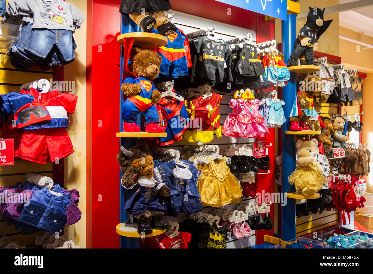 Build-A-Bear clothes display in Hamleys, toyshop, large toy store on London's Regent St, UK toy shop shelf Stock Photo