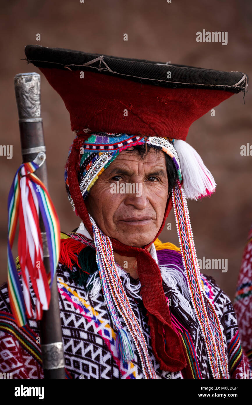 Local Quechua mayor (varayoc) dressed in traditional costume before mass, Pisac Sunday Market, Cusco, Peru Stock Photo