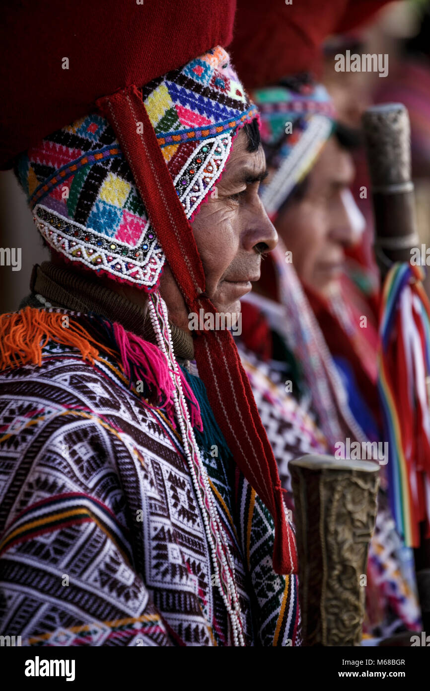 Local mayors (varayocs) before Quechua mass, Sunday Market, Pisac, Cusco, Peru Stock Photo
