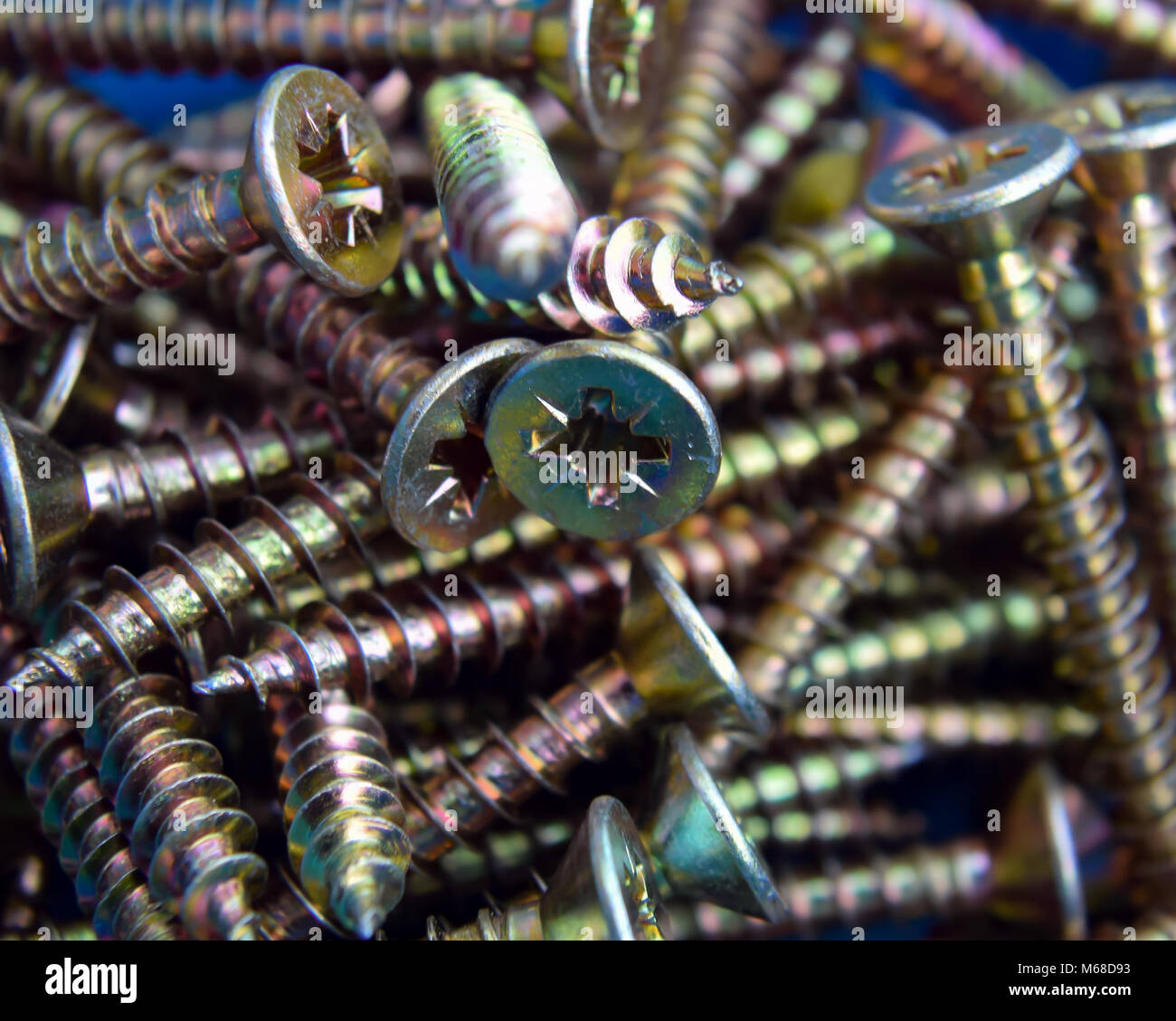 box of gold screws Stock Photo Alamy