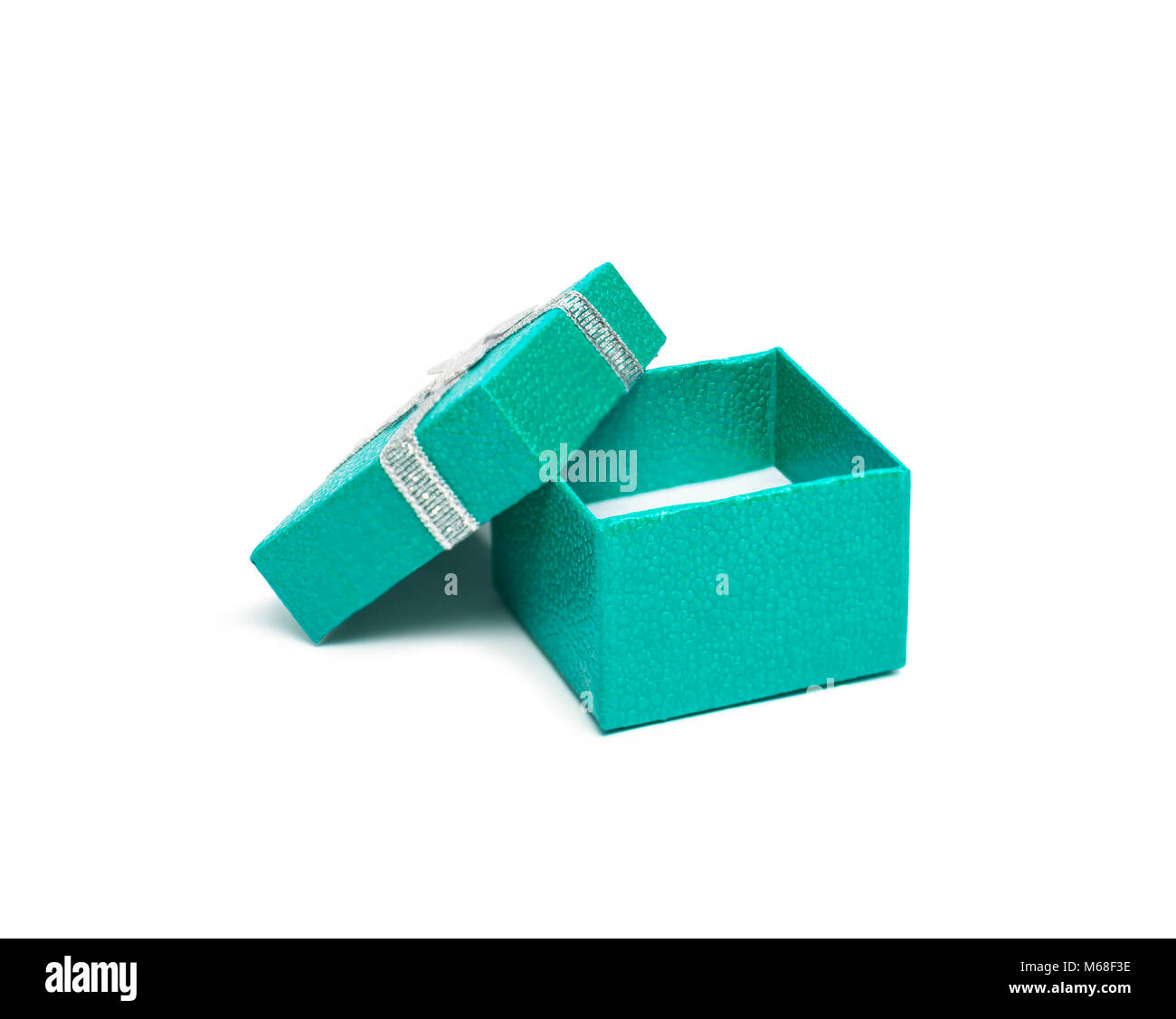Open Teal color gift box with silver ribbon isolated on white