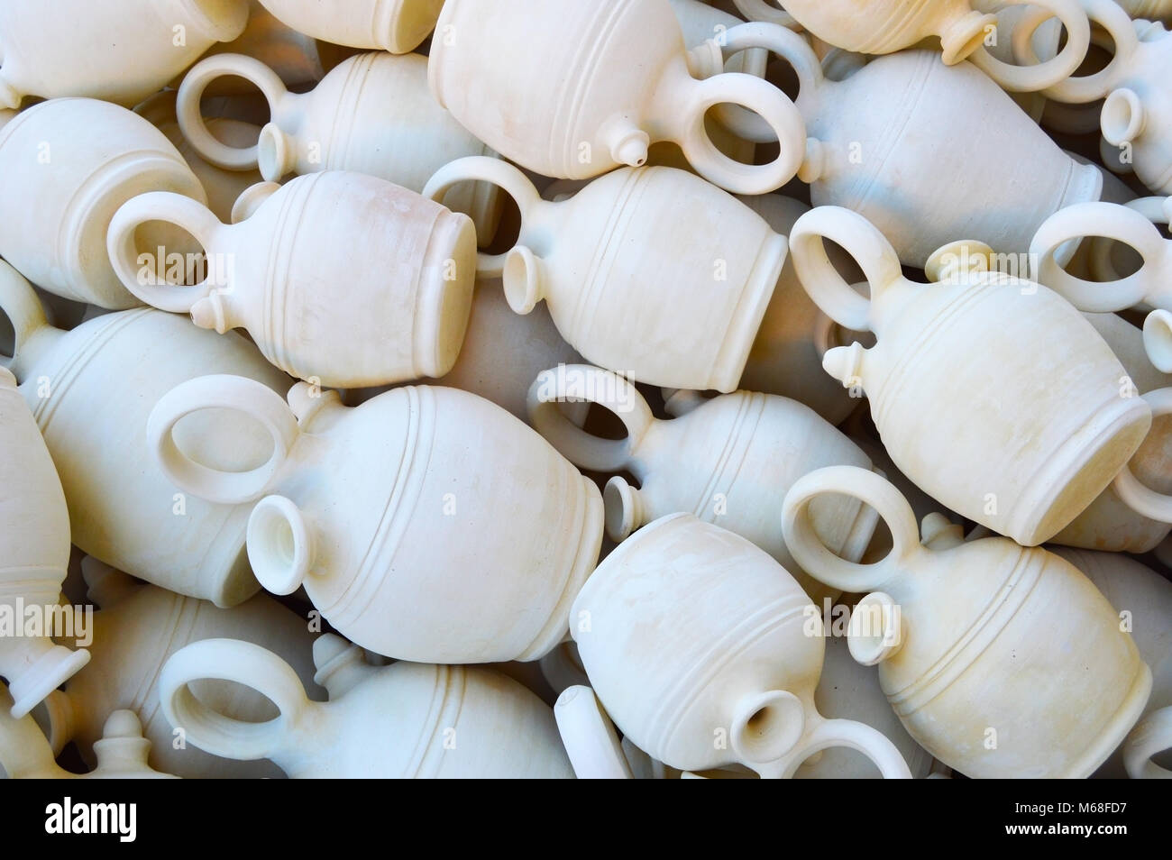 Background with white Spanish clay pot at a flea market in Madrid