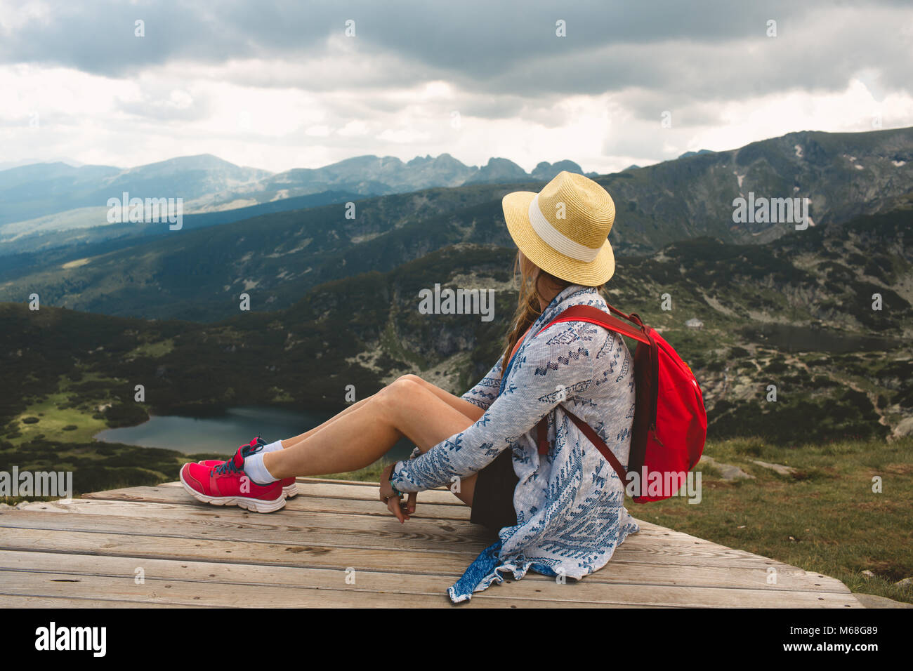 Girl traveling in Rila mountains Bulgaria Stock Photo
