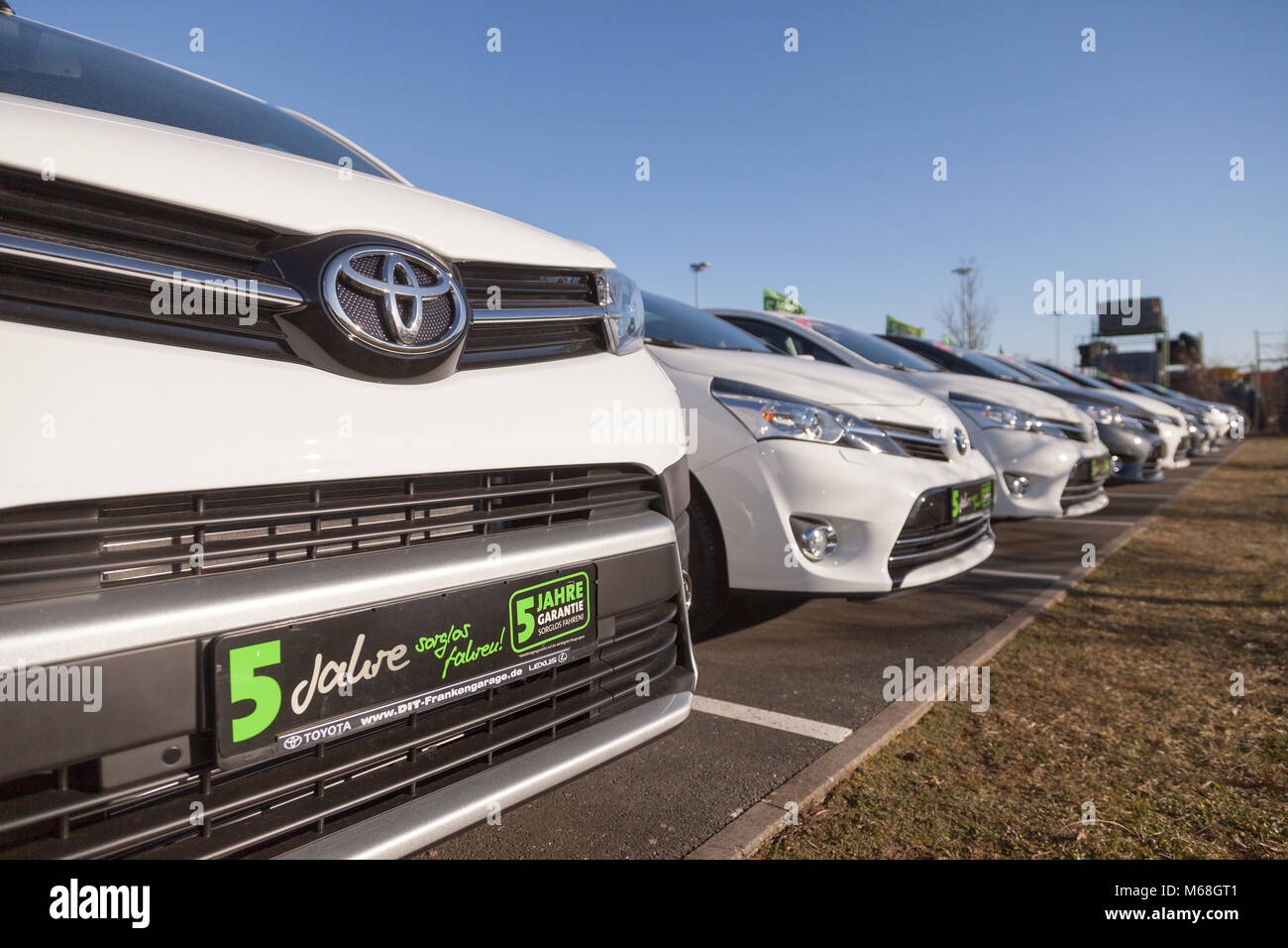 FUERTH / GERMANY - FEBRUARY 25, 2018: Toyota logo on a car. Toyota Motor Corporation is a Japanese multinational automotive manufacturer headquartered Stock Photo