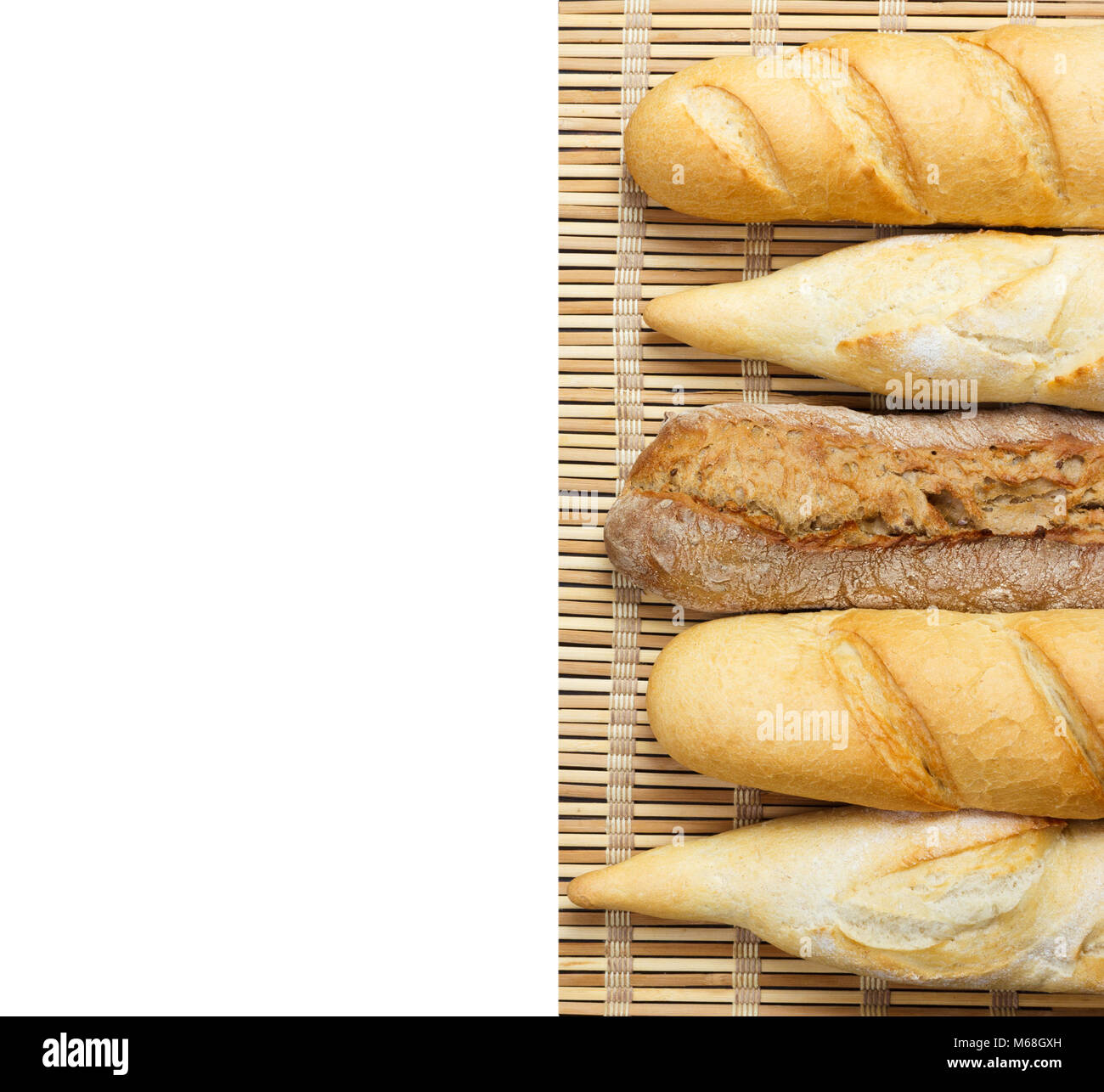 baguette of whole wheat bread on a white background Stock Photo Alamy