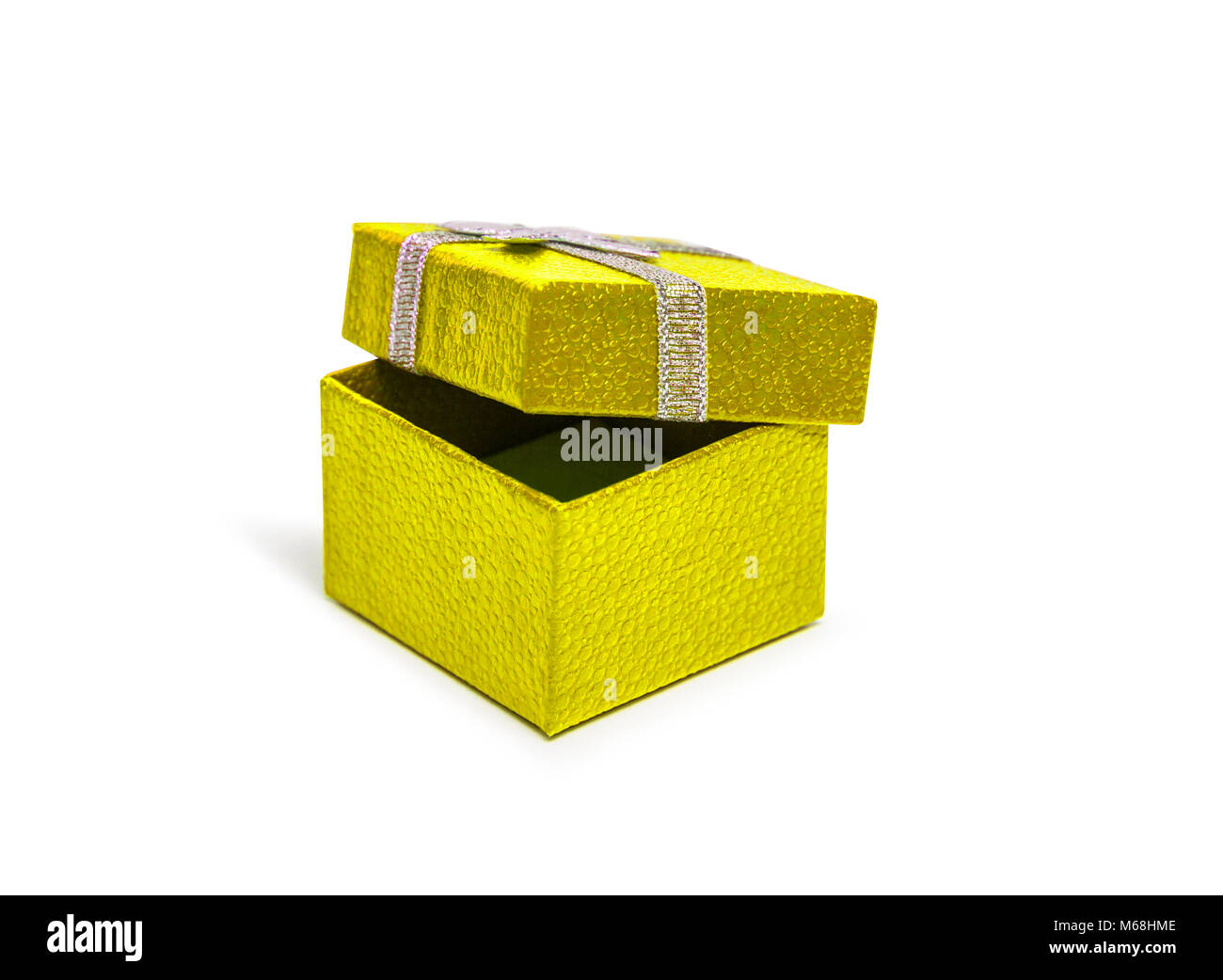 Open Yellow gift box with silver ribbon isolated on white background