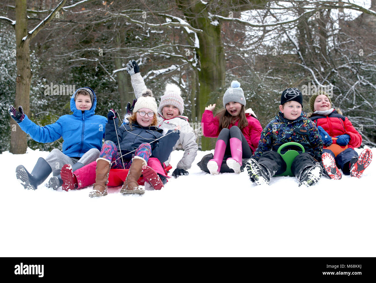 Pupils from St Mary's Primary School in Edinburgh, enjoy a day off school sledging in the city's Queen Street Gardens, as storm Emma, rolling in from the Atlantic, looks poised to meet the Beast from the East's chilly Russia air - causing further widespread snowfall and bitter temperatures. Stock Photo
