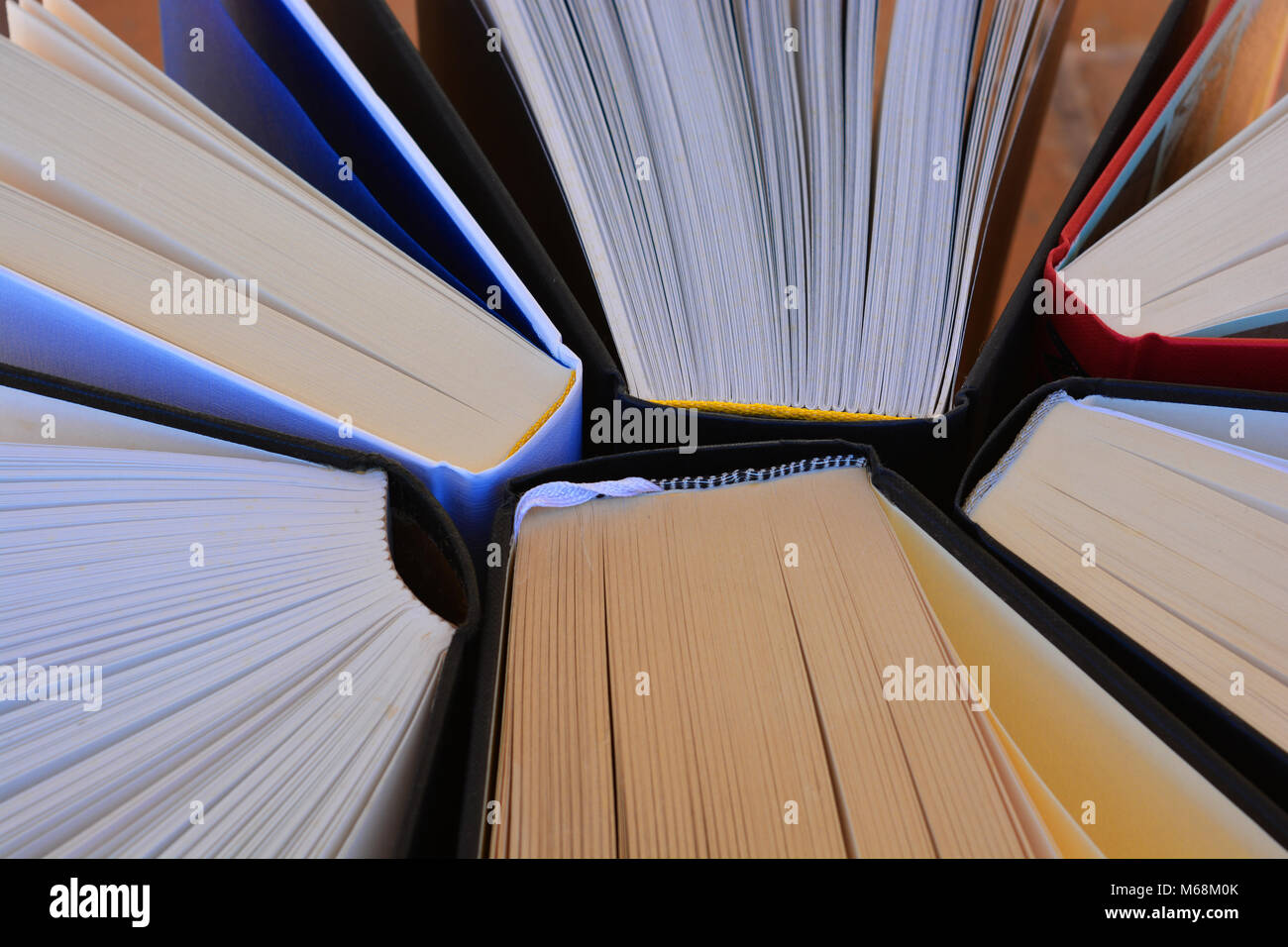 Hardback books, with pages fanned open Stock Photo