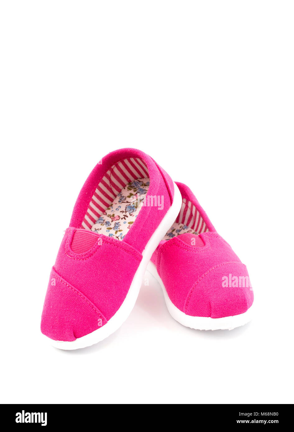 Pair of Pink Children's Shoes on a White Background Stock Photo - Alamy