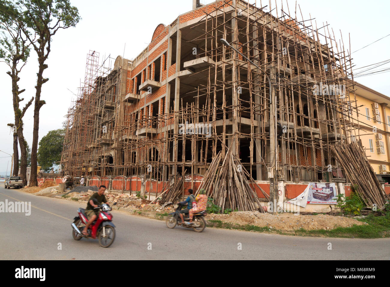Restoration of old buildings using bamboo scaffolding; Kampot, Cambodia Asia Stock Photo