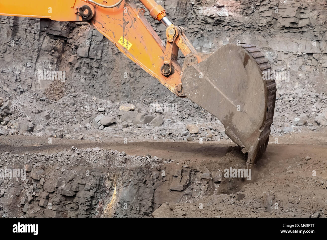 excavator digging at a Manganese Mining and processing plant Stock