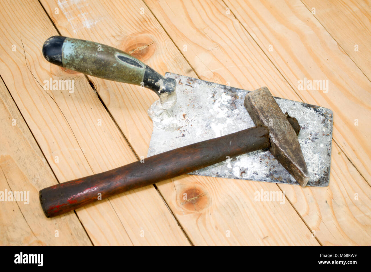 Trowel and hammer Stock Photo Alamy