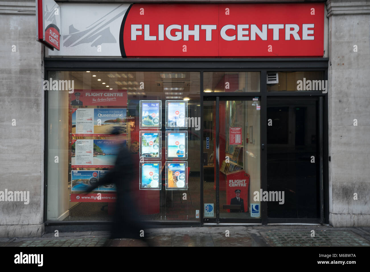 Following the news of two high street retailers going out of business, there are fears for others. A view of the Flight Centre retailer in Regents Str Stock Photo