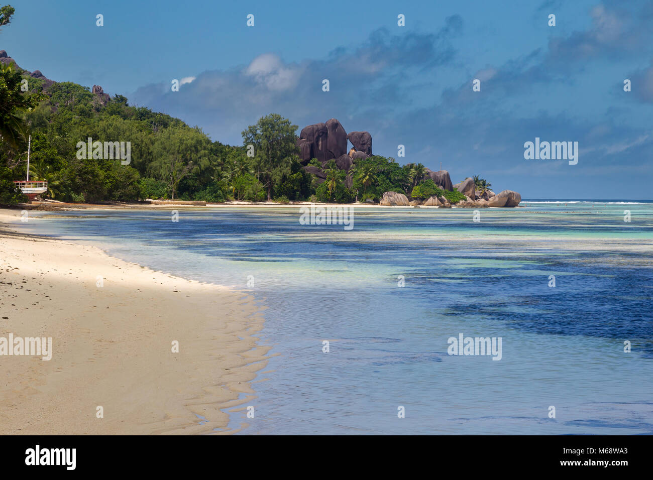 Lonesome tropical beach on La Digue, Seychelles. Stock Photo