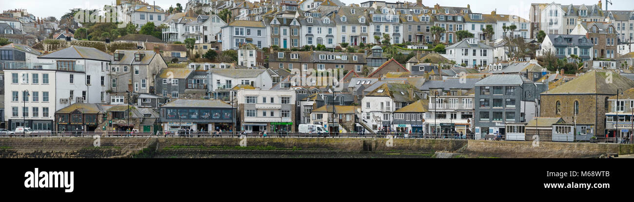 Closeup panoramic image of St. Ives town harbourside shops, cottages, buildings and houses, Cornwall, England, UK Stock Photo
