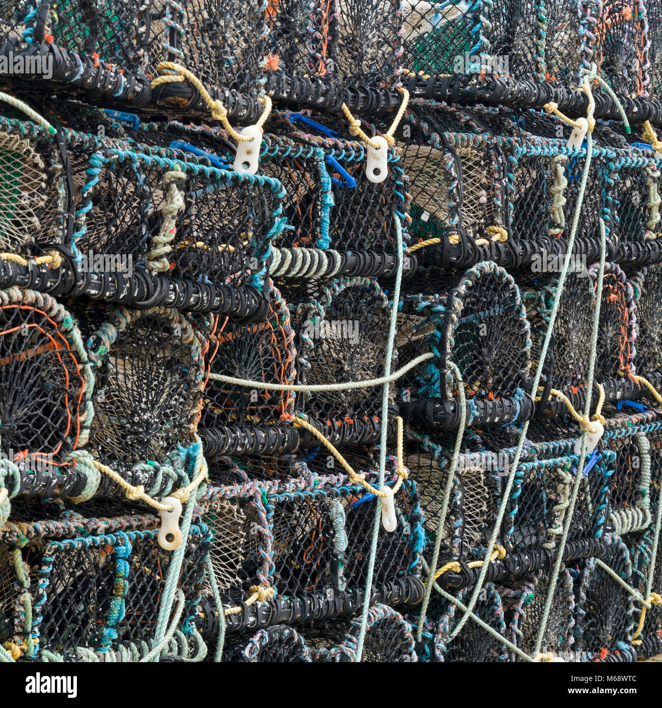 Stack of lobster and crab fishing pot cages creels, St. Ives, Cornwall, England, UK Stock Photo